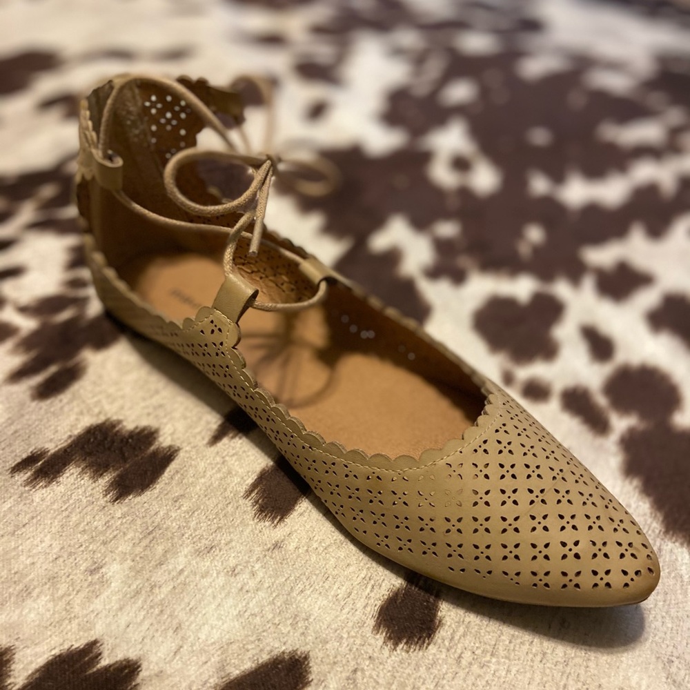 Tan front tie flats